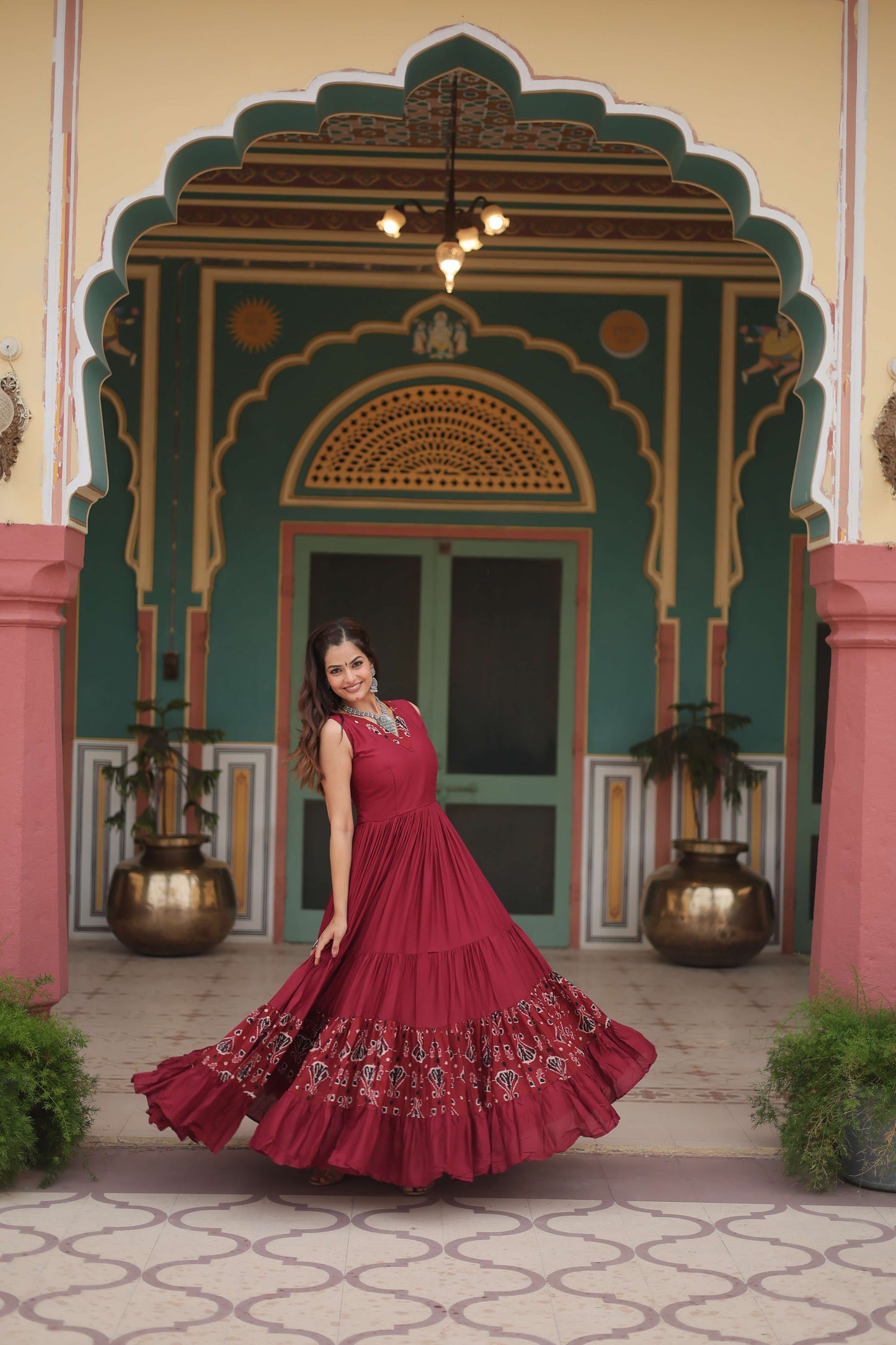 Maroon Designer Heavy Reyon Gown with Printed Frill & Fancy V-Neck