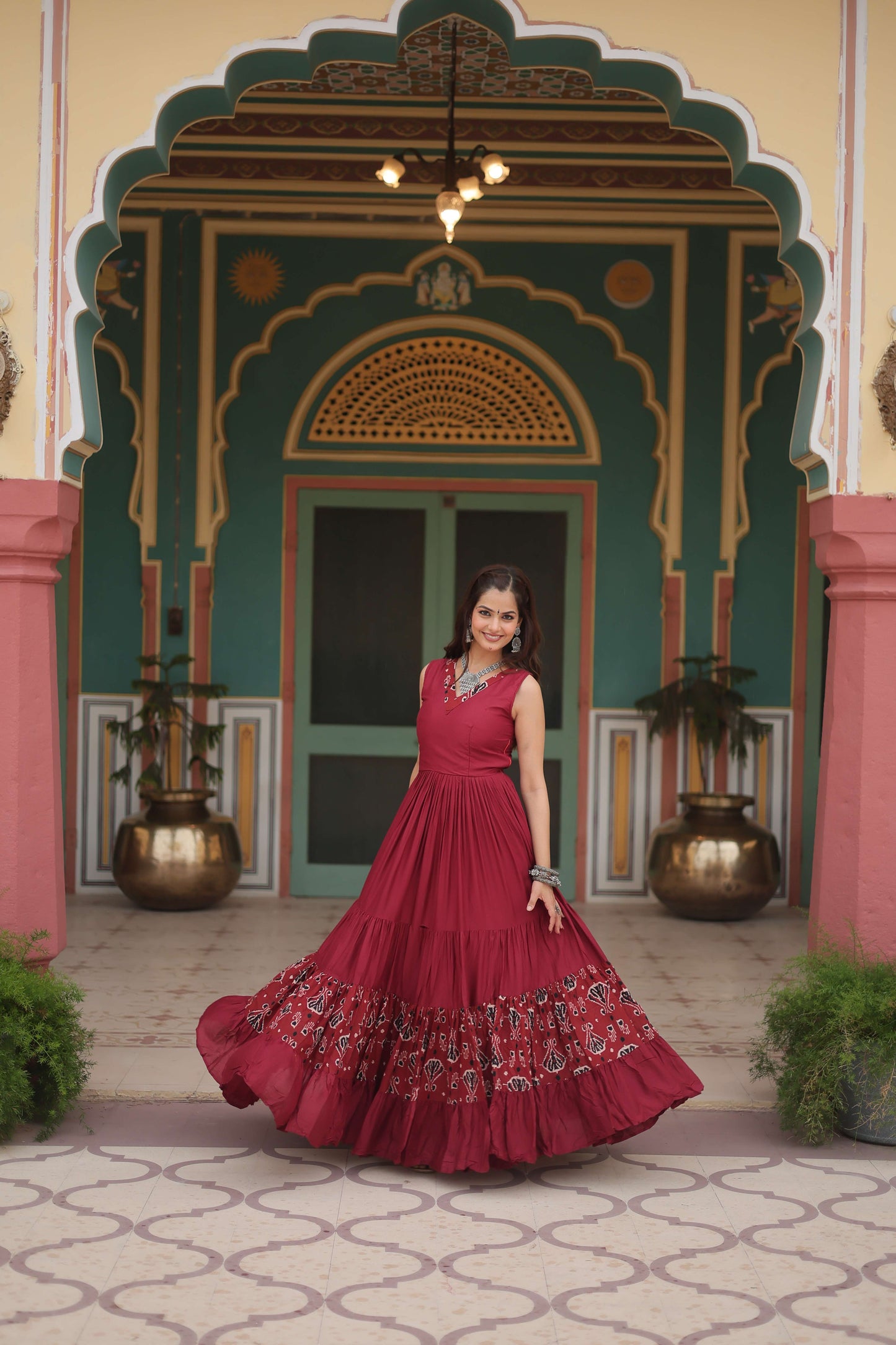 Maroon Designer Heavy Reyon Gown with Printed Frill & Fancy V-Neck