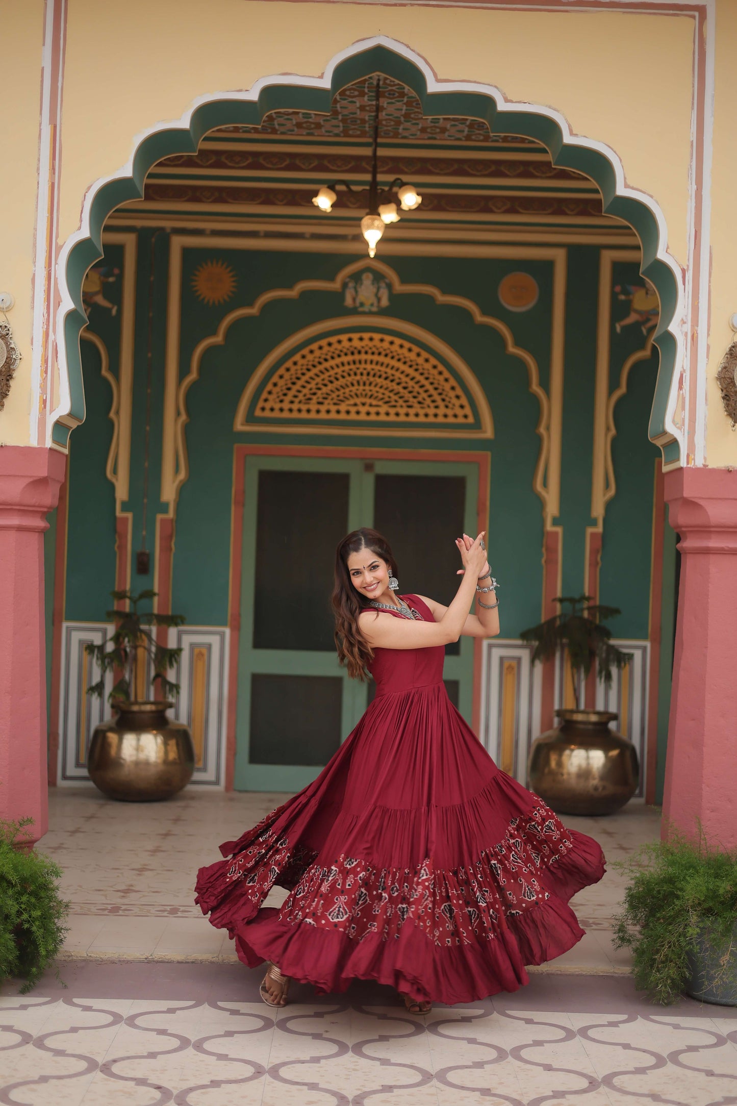 Maroon Designer Heavy Reyon Gown with Printed Frill & Fancy V-Neck