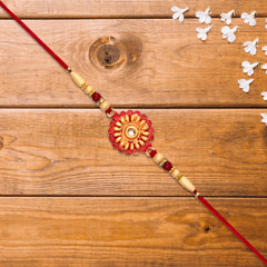 Floral Bead Rakhi With Central Stone