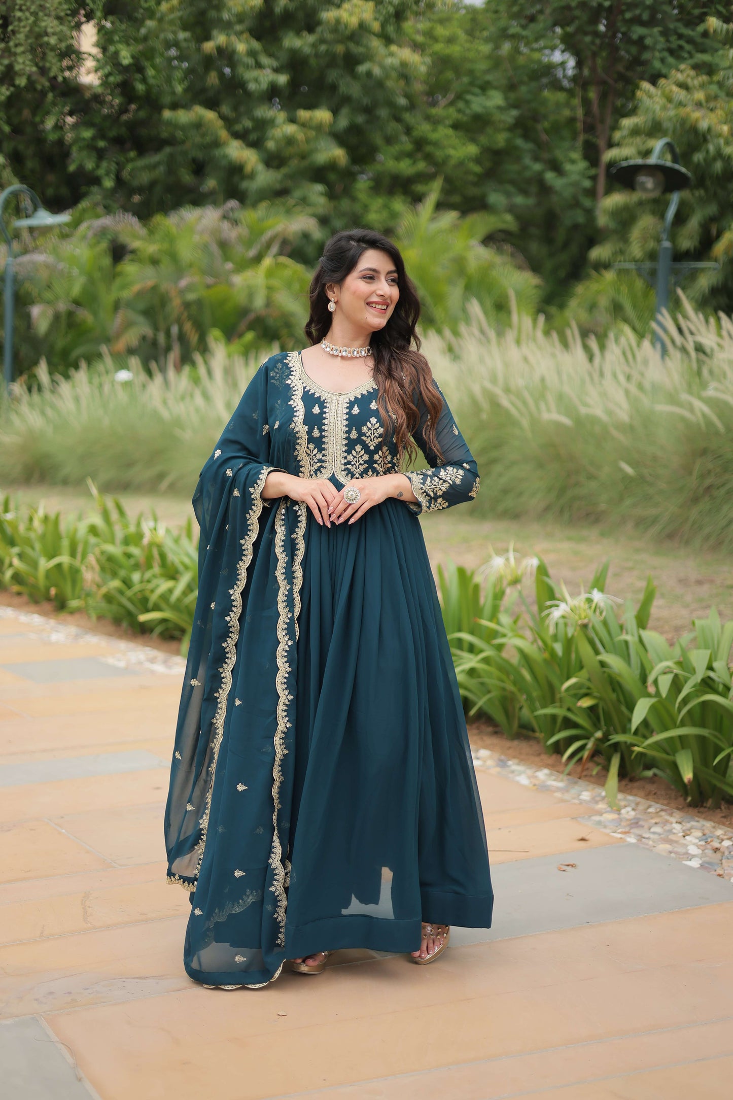 Teal-Blue Elegant Kutchi Gamthi Work Reyon Gown with Heavy Flair