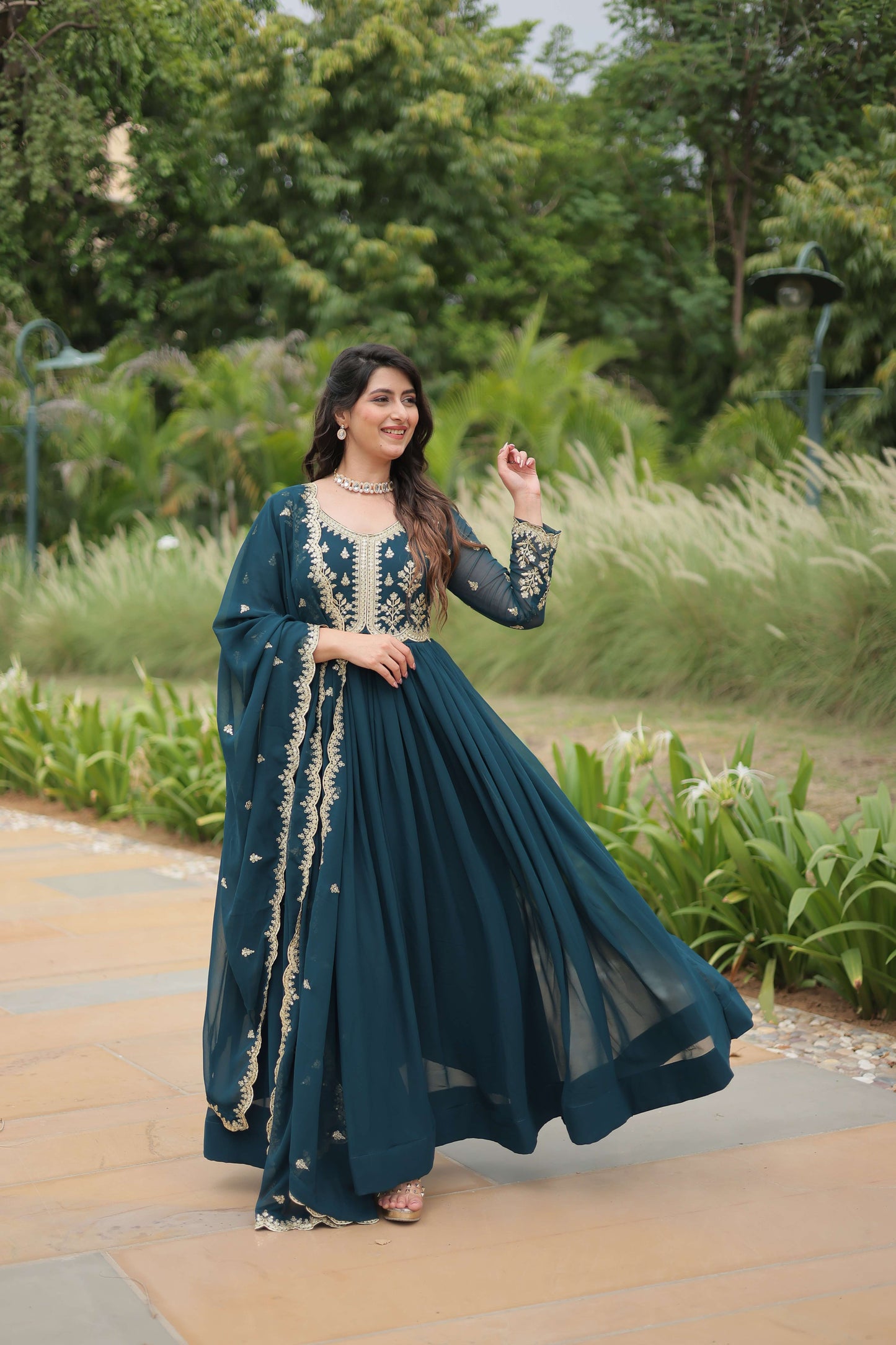 Teal-Blue Elegant Kutchi Gamthi Work Reyon Gown with Heavy Flair