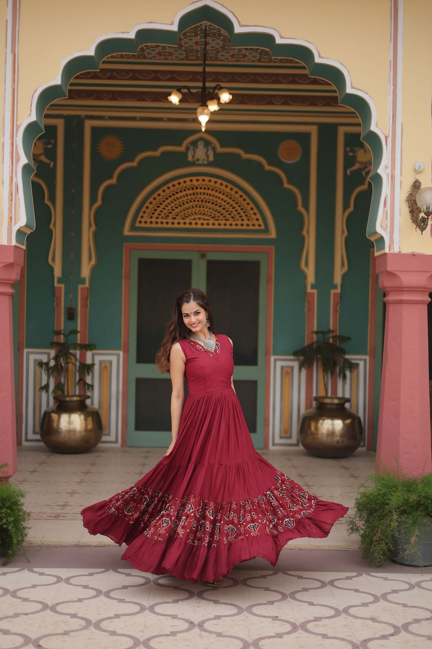 Maroon Designer Heavy Reyon Gown with Printed Frill & Fancy V-Neck