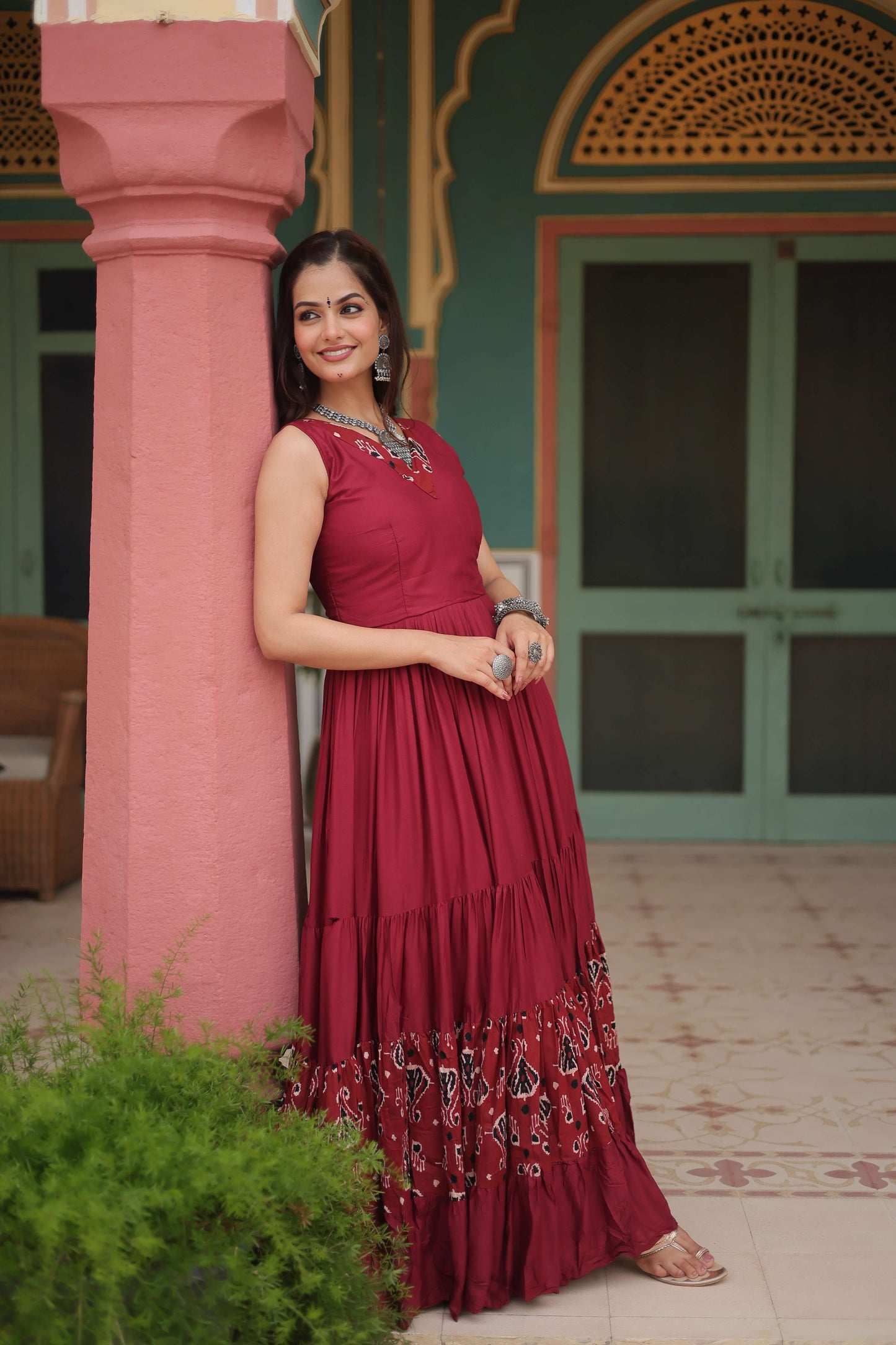 Maroon Designer Heavy Reyon Gown with Printed Frill & Fancy V-Neck