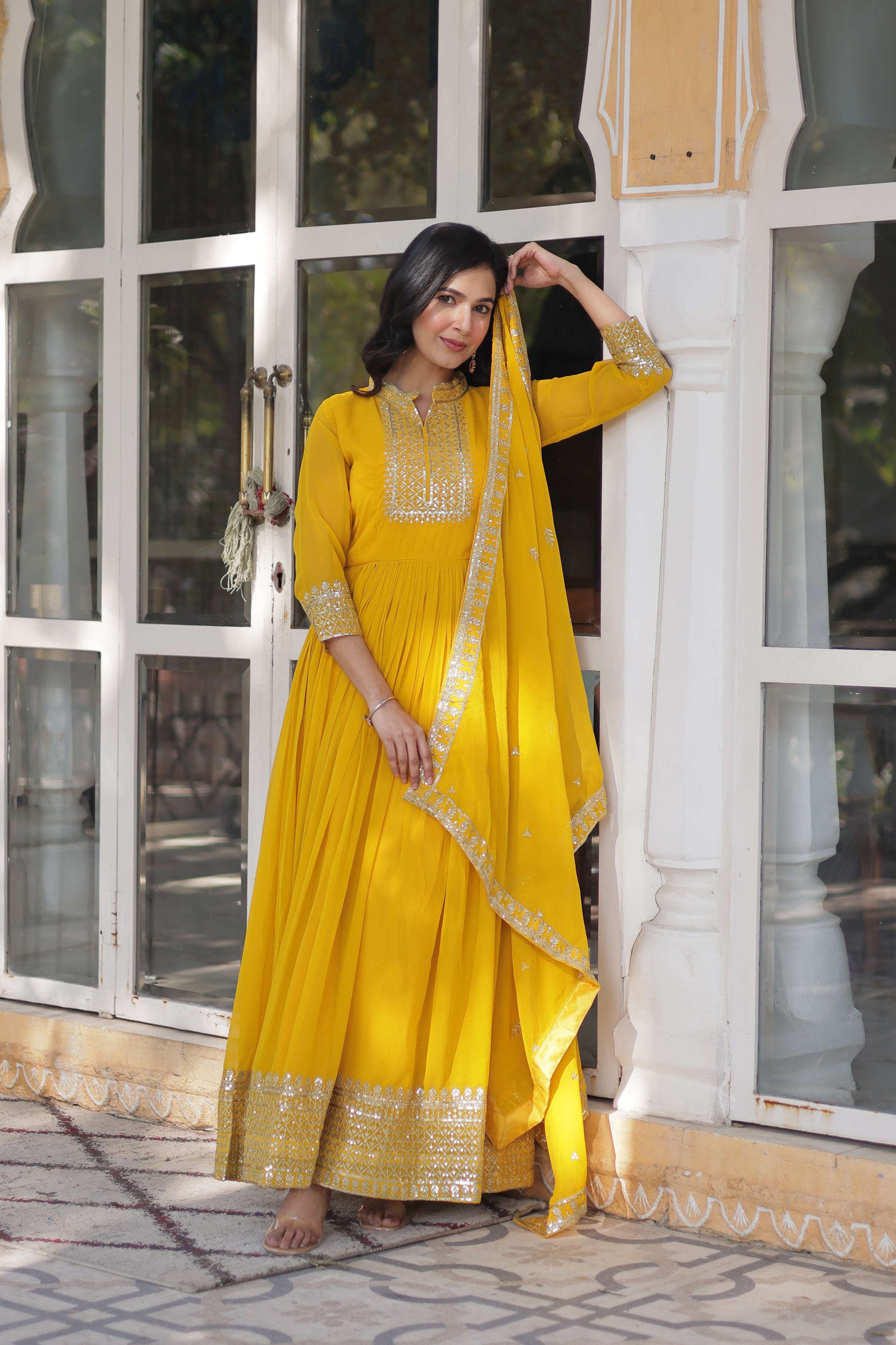 Yellow Faux Blooming Georgette Sequins Embroidered Gown with Matching Dupatta