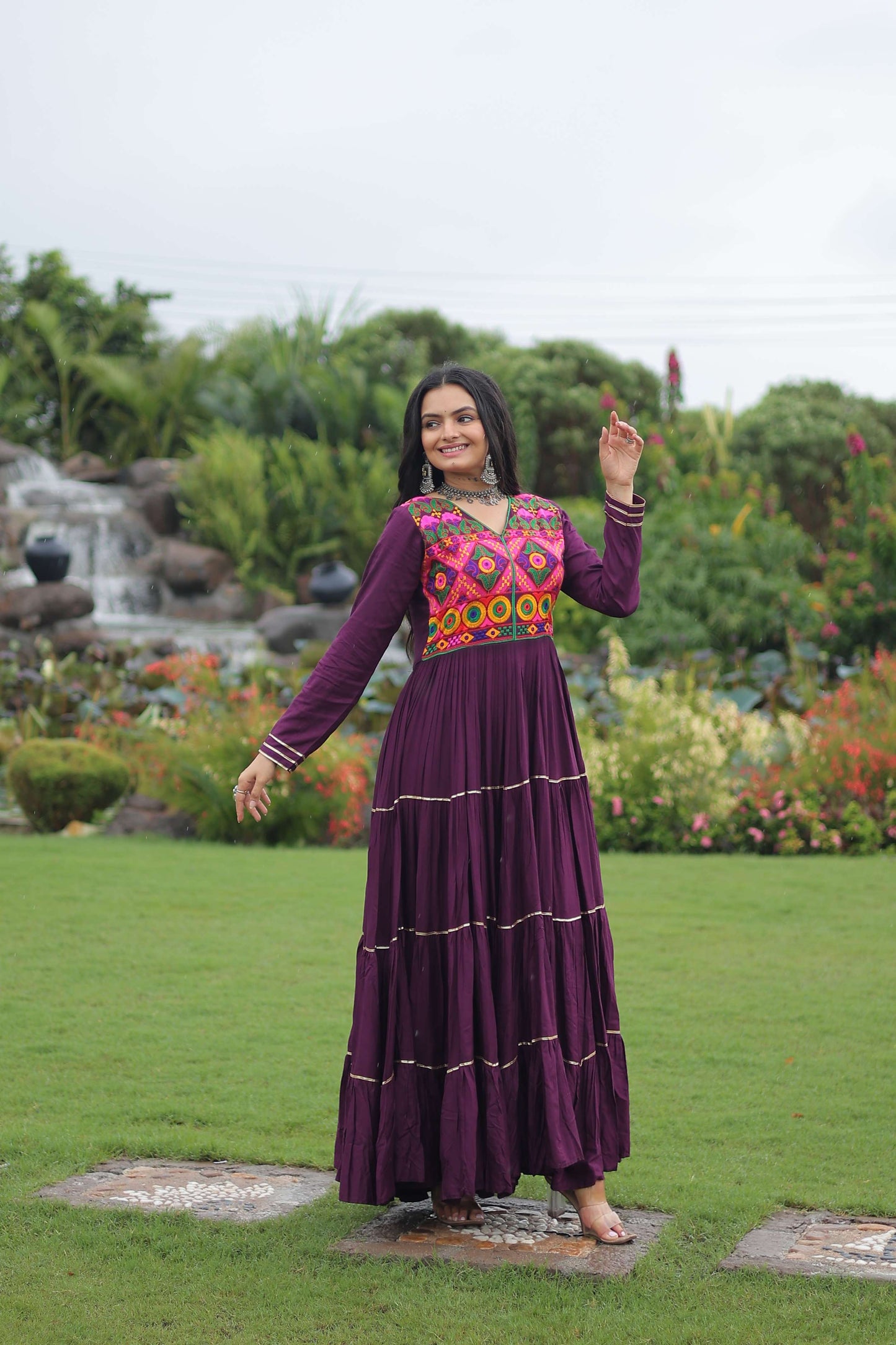Wine Premium Navratri Gown with Kutchi Gamthi Embroidery, Mirror Work & Frill Detailing – Elegant Ethnic Wear for Women