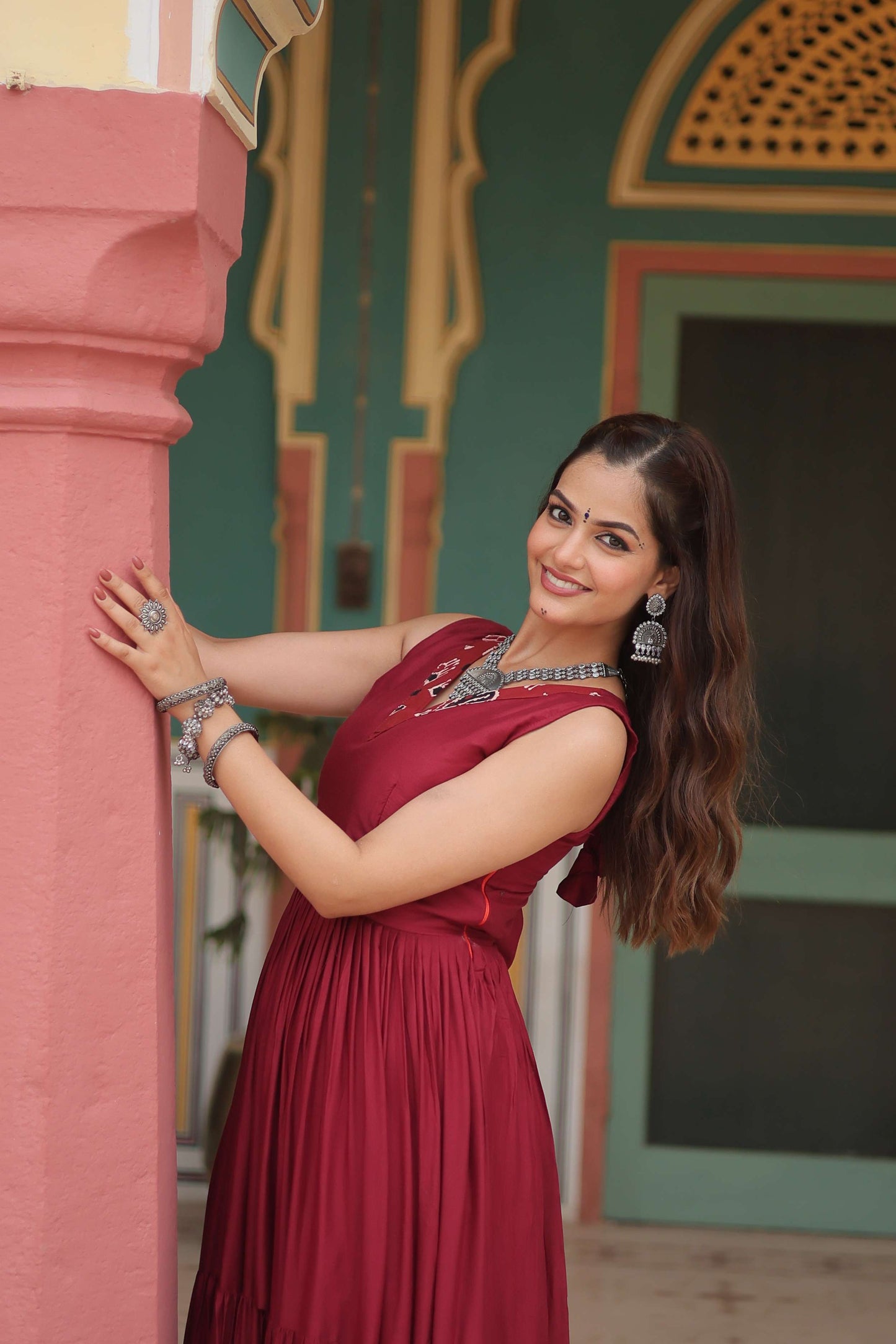 Maroon Designer Heavy Reyon Gown with Printed Frill & Fancy V-Neck