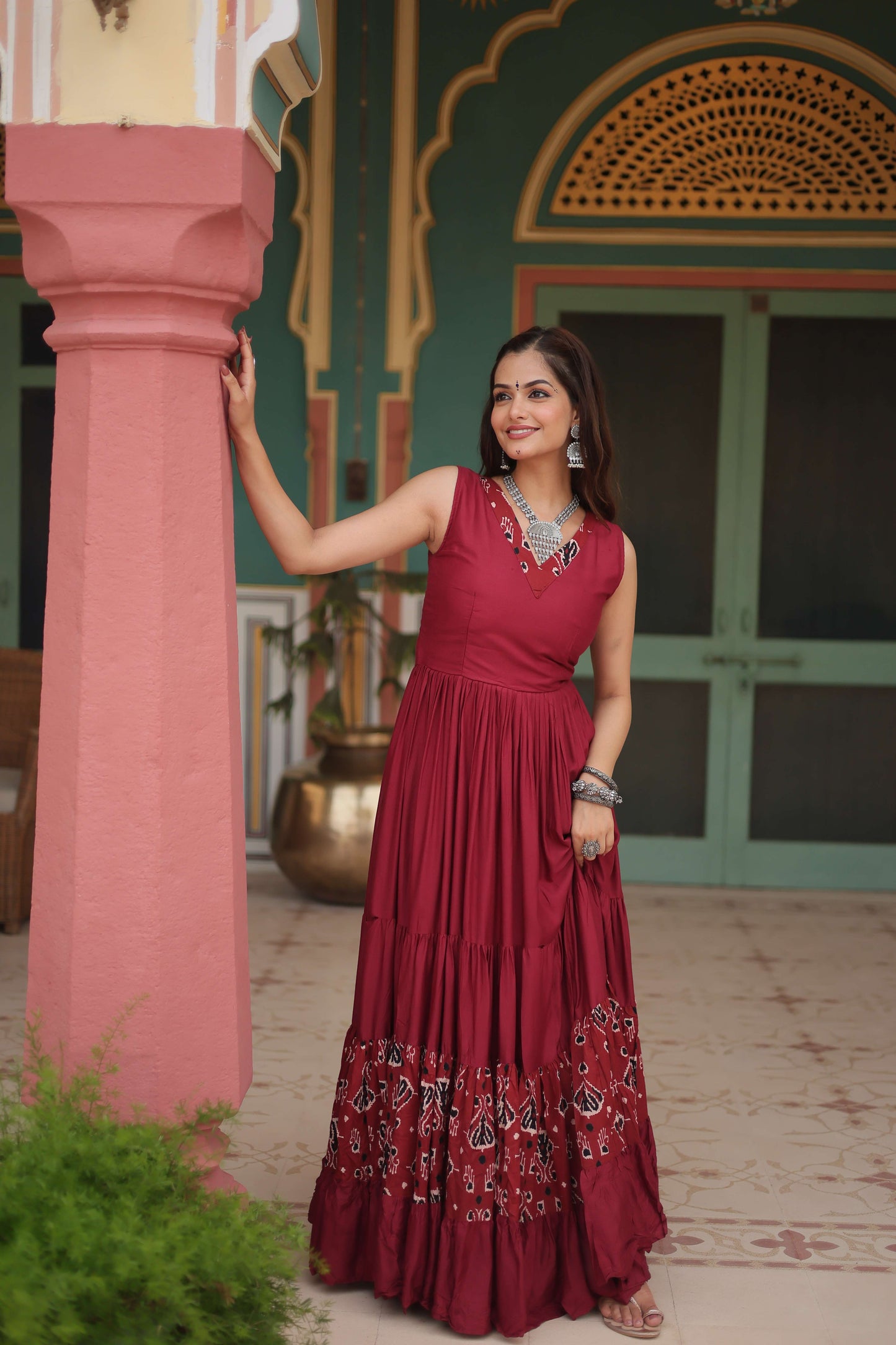 Maroon Designer Heavy Reyon Gown with Printed Frill & Fancy V-Neck